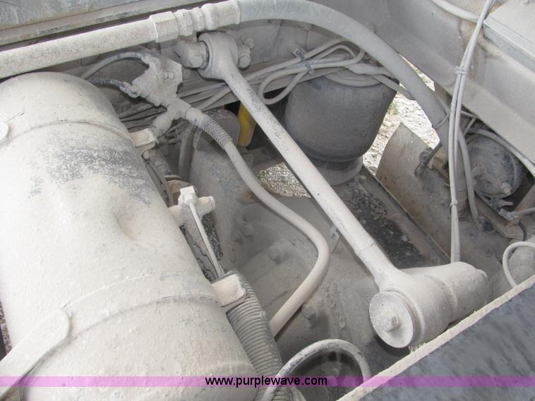 image for item F7111 2000 Freightliner FLD120SD tri axle dump truck