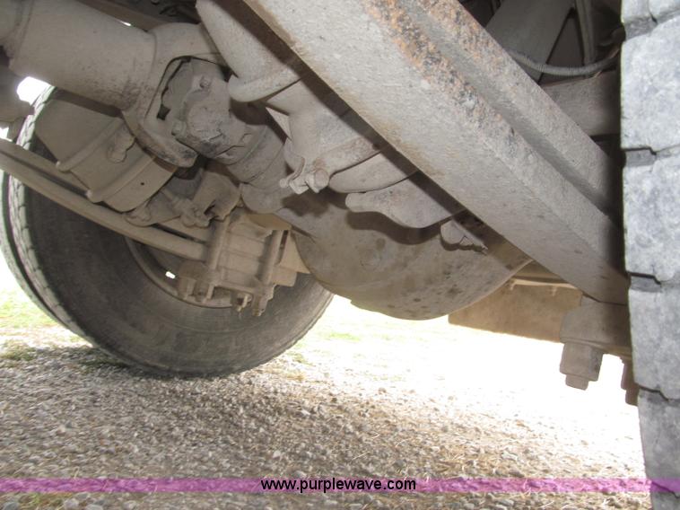 image for item F7111 2000 Freightliner FLD120SD tri axle dump truck