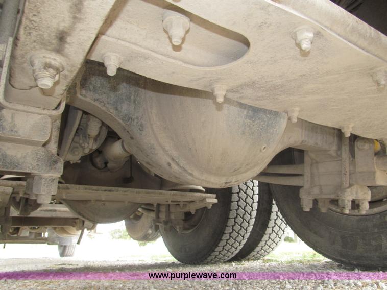 image for item F7111 2000 Freightliner FLD120SD tri axle dump truck