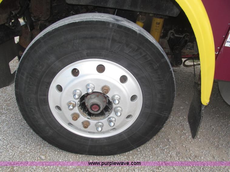 image for item F7111 2000 Freightliner FLD120SD tri axle dump truck