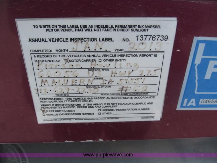 image for item F7111 2000 Freightliner FLD120SD tri axle dump truck