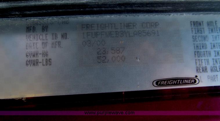 image for item F7111 2000 Freightliner FLD120SD tri axle dump truck