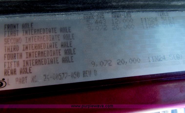 image for item F7111 2000 Freightliner FLD120SD tri axle dump truck