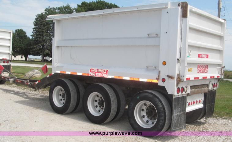 image for item F7112 1999 Cornhusker triple axle 14' pup dump trailer