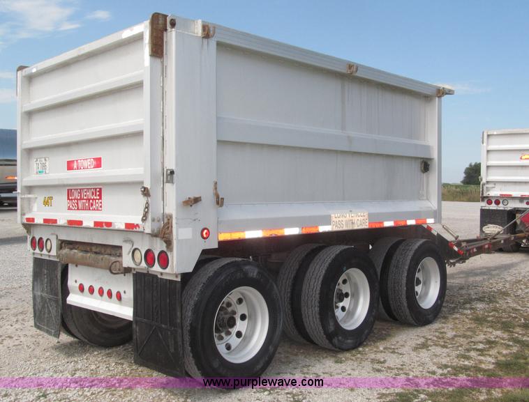 image for item F7112 1999 Cornhusker triple axle 14' pup dump trailer