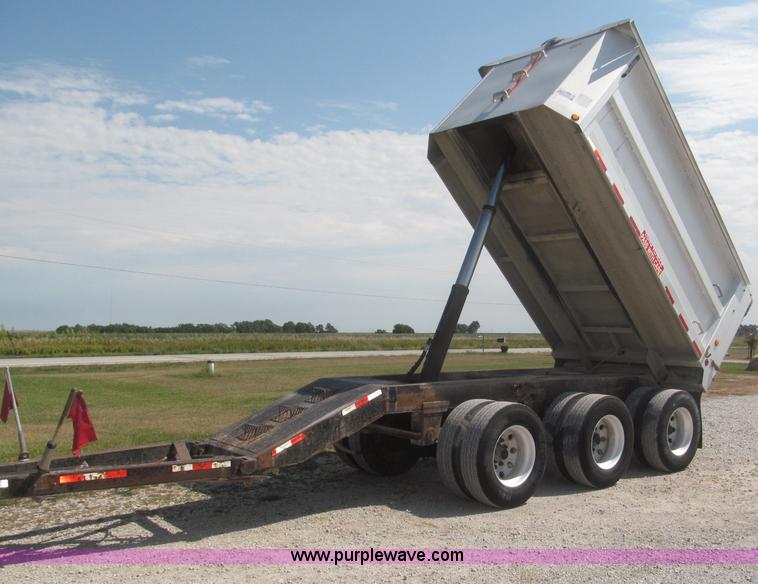 image for item F7112 1999 Cornhusker triple axle 14' pup dump trailer