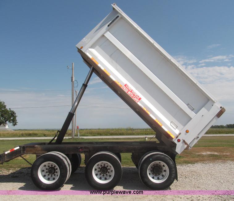 image for item F7112 1999 Cornhusker triple axle 14' pup dump trailer