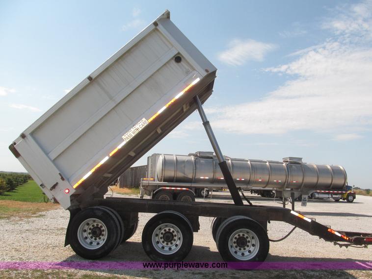 image for item F7112 1999 Cornhusker triple axle 14' pup dump trailer