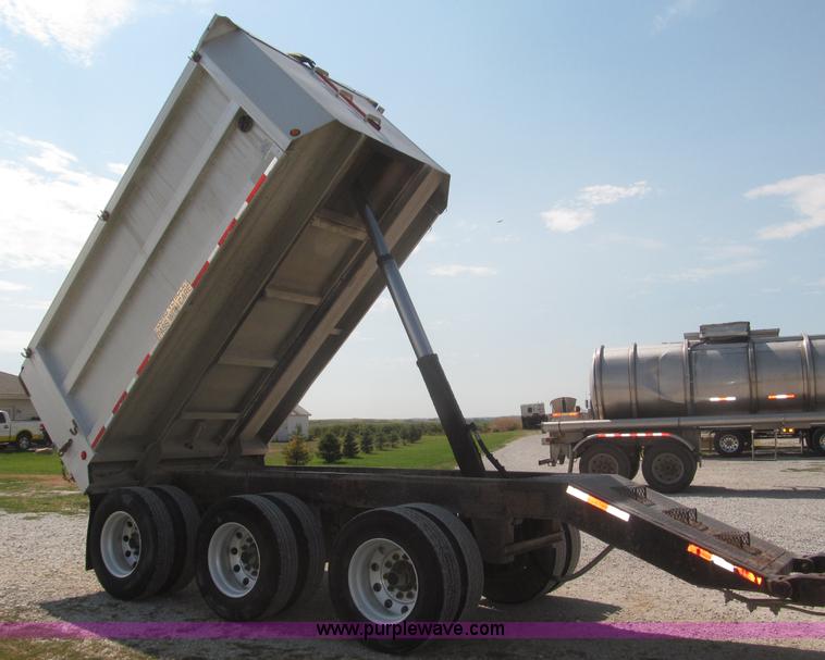 image for item F7112 1999 Cornhusker triple axle 14' pup dump trailer
