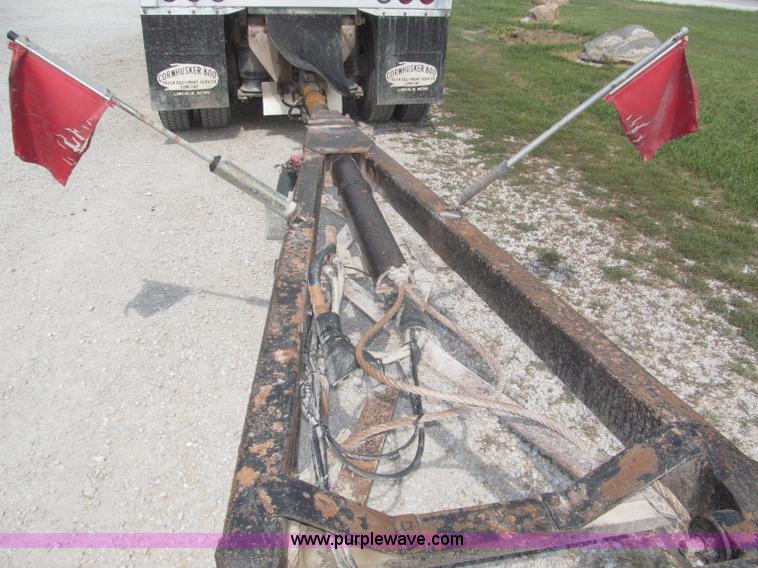 image for item F7112 1999 Cornhusker triple axle 14' pup dump trailer