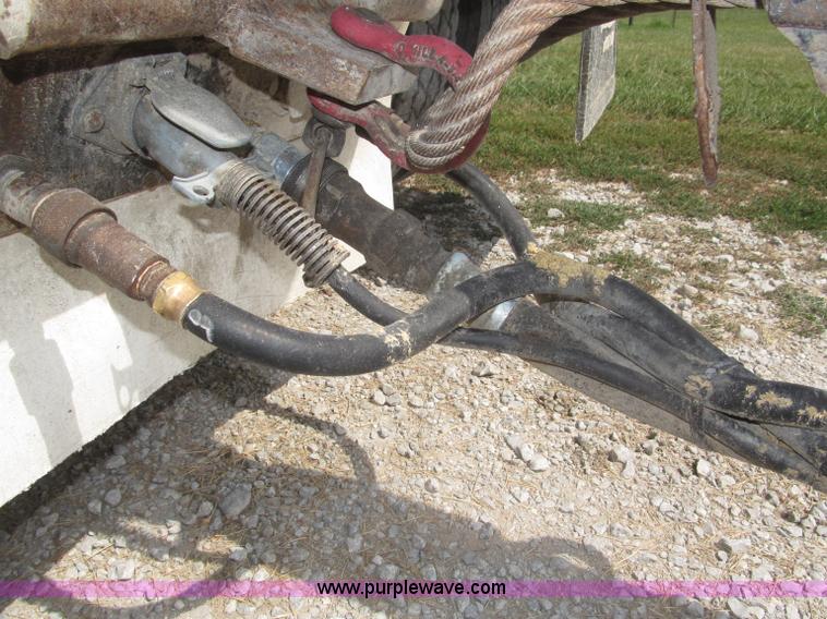 image for item F7112 1999 Cornhusker triple axle 14' pup dump trailer