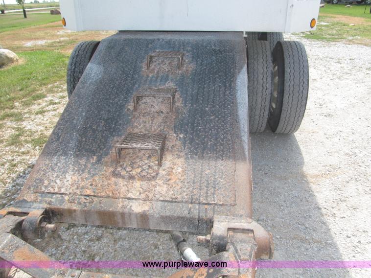 image for item F7112 1999 Cornhusker triple axle 14' pup dump trailer