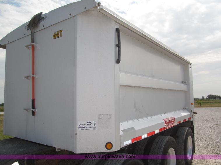 image for item F7112 1999 Cornhusker triple axle 14' pup dump trailer