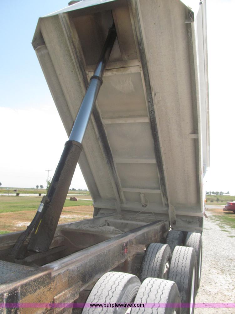 image for item F7112 1999 Cornhusker triple axle 14' pup dump trailer