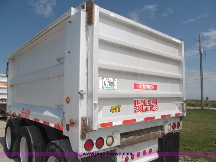 image for item F7112 1999 Cornhusker triple axle 14' pup dump trailer