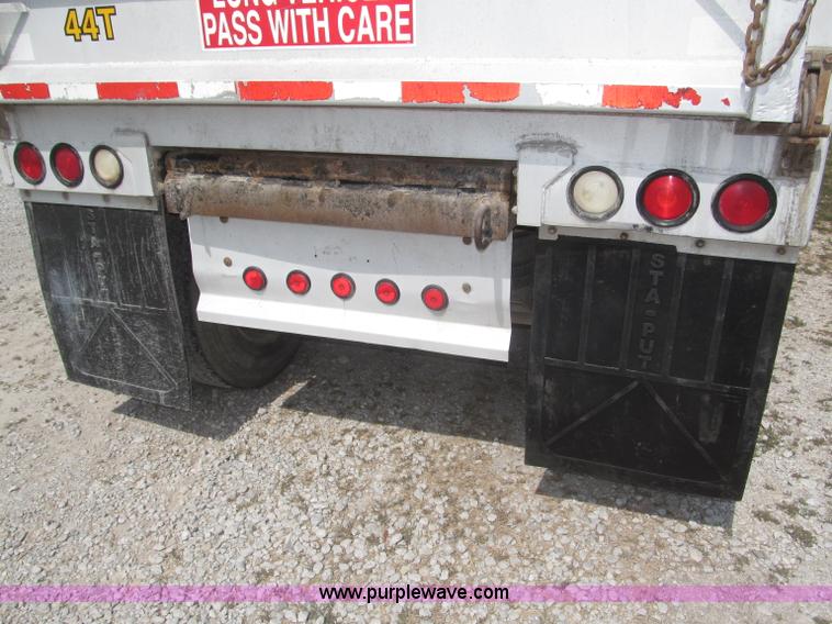 image for item F7112 1999 Cornhusker triple axle 14' pup dump trailer