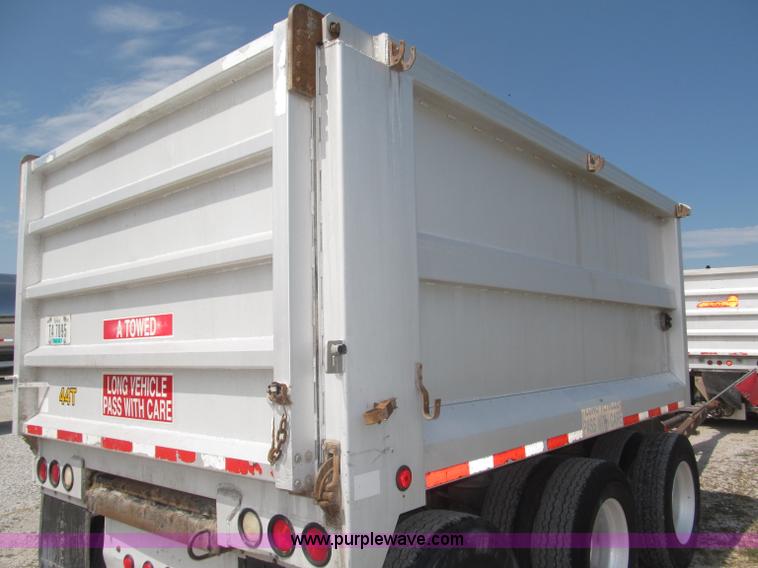 image for item F7112 1999 Cornhusker triple axle 14' pup dump trailer