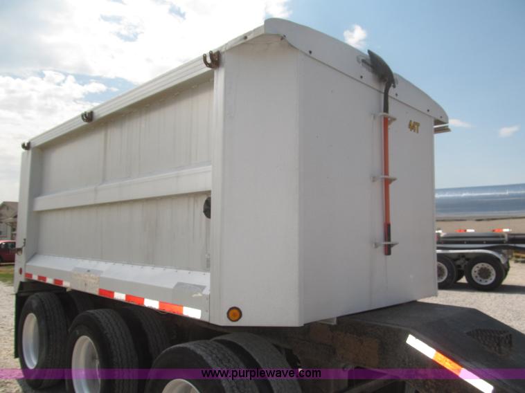 image for item F7112 1999 Cornhusker triple axle 14' pup dump trailer