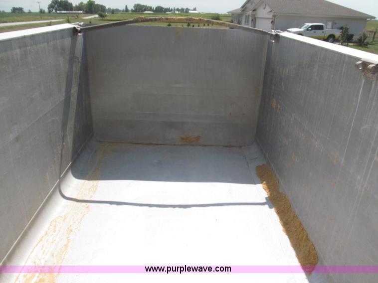 image for item F7112 1999 Cornhusker triple axle 14' pup dump trailer