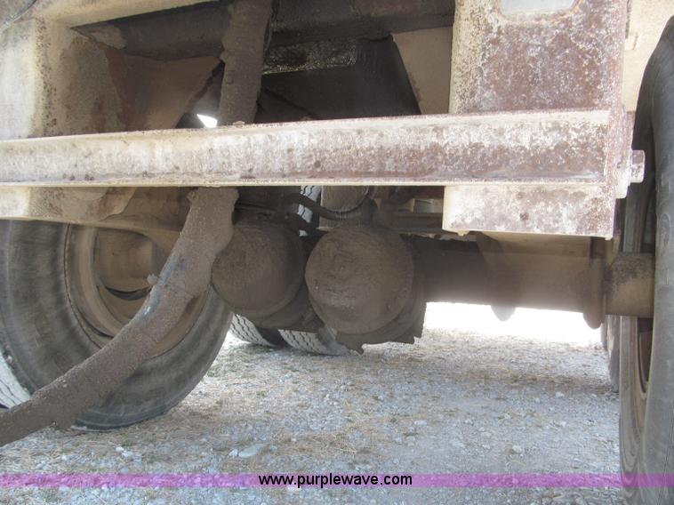 image for item F7112 1999 Cornhusker triple axle 14' pup dump trailer