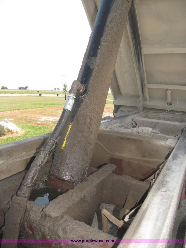 image for item F7112 1999 Cornhusker triple axle 14' pup dump trailer