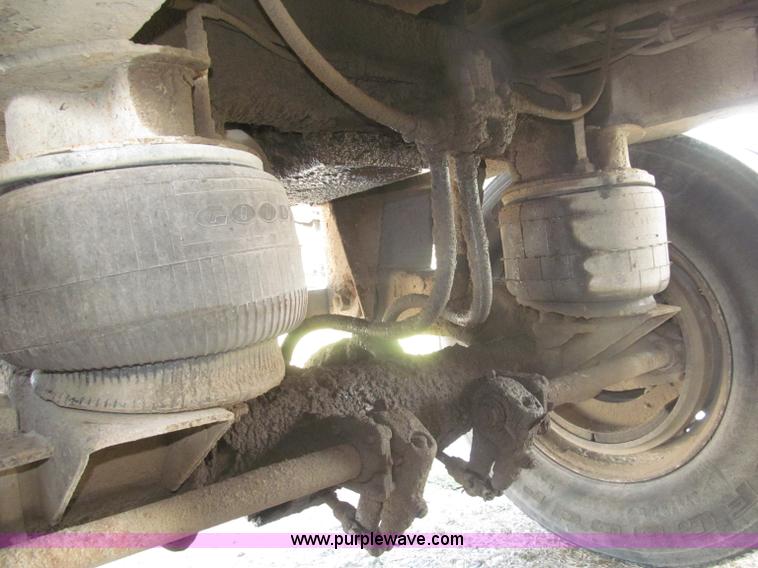 image for item F7112 1999 Cornhusker triple axle 14' pup dump trailer