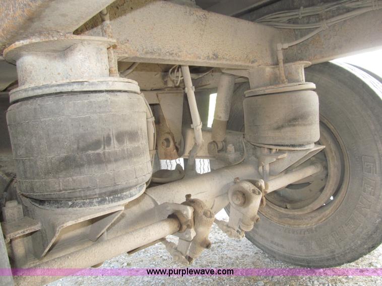 image for item F7112 1999 Cornhusker triple axle 14' pup dump trailer