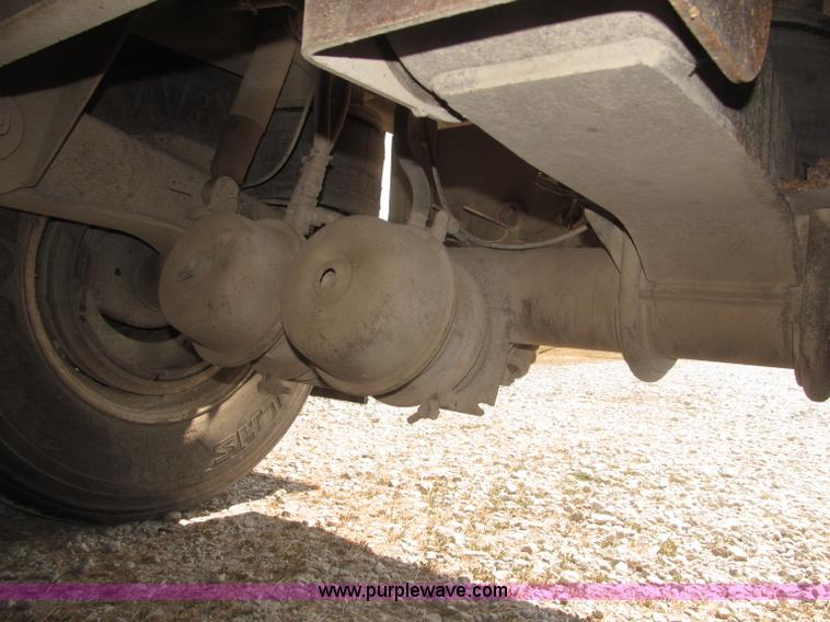 image for item F7112 1999 Cornhusker triple axle 14' pup dump trailer