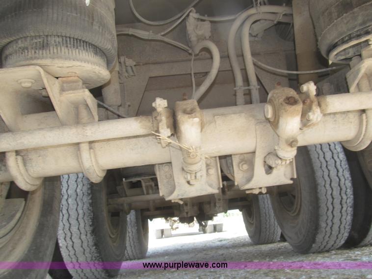 image for item F7112 1999 Cornhusker triple axle 14' pup dump trailer