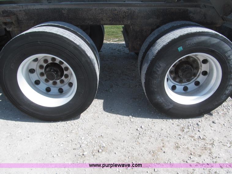 image for item F7112 1999 Cornhusker triple axle 14' pup dump trailer