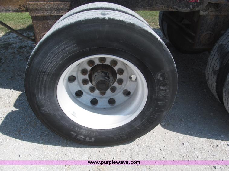 image for item F7112 1999 Cornhusker triple axle 14' pup dump trailer