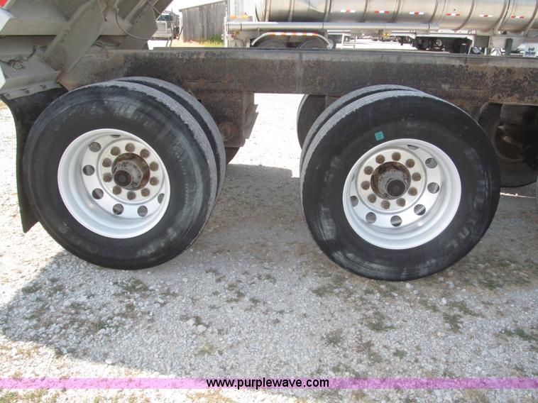 image for item F7112 1999 Cornhusker triple axle 14' pup dump trailer