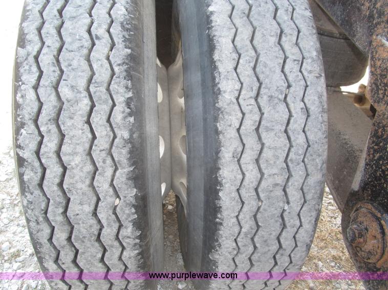 image for item F7112 1999 Cornhusker triple axle 14' pup dump trailer