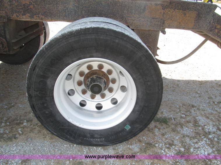 image for item F7112 1999 Cornhusker triple axle 14' pup dump trailer