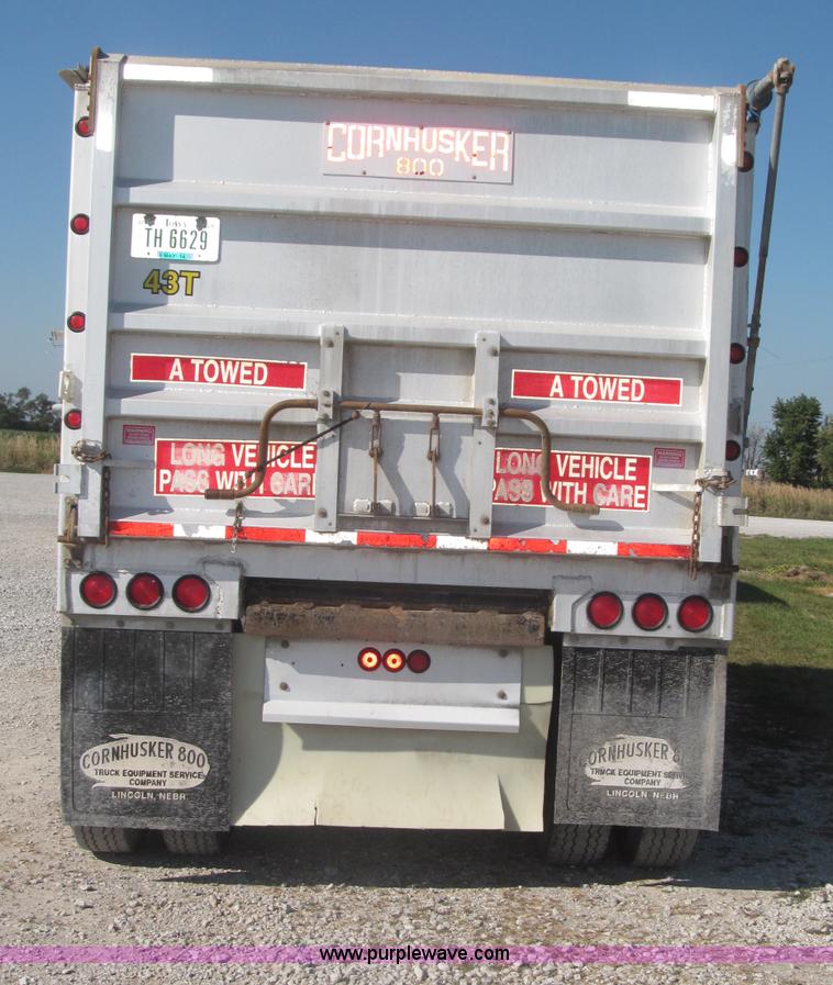 image for item F7114 2003 Cornhusker 800R 16' triple axle aluminum pup dump trailer