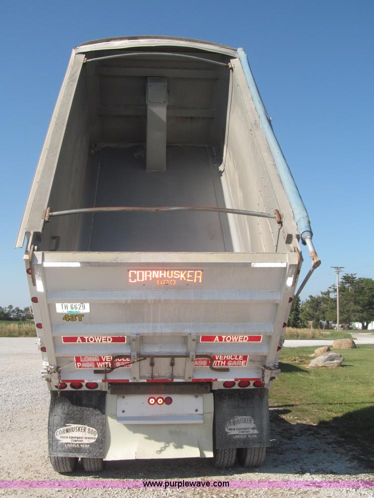 image for item F7114 2003 Cornhusker 800R 16' triple axle aluminum pup dump trailer