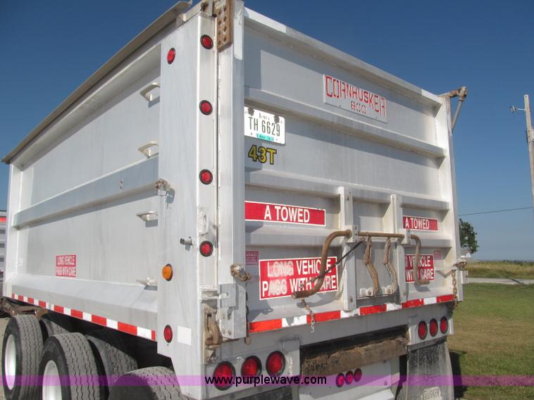 image for item F7114 2003 Cornhusker 800R 16' triple axle aluminum pup dump trailer