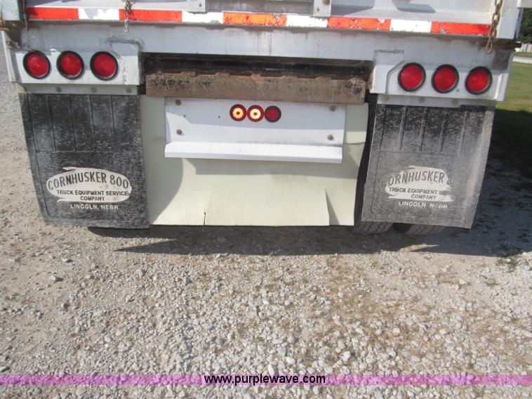 image for item F7114 2003 Cornhusker 800R 16' triple axle aluminum pup dump trailer