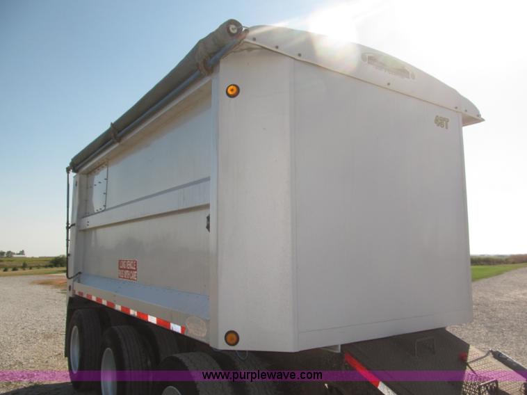 image for item F7114 2003 Cornhusker 800R 16' triple axle aluminum pup dump trailer