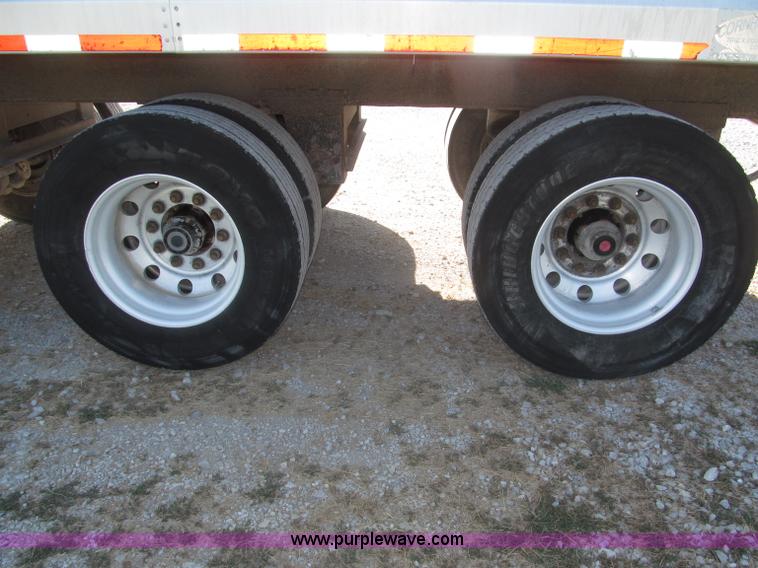 image for item F7114 2003 Cornhusker 800R 16' triple axle aluminum pup dump trailer