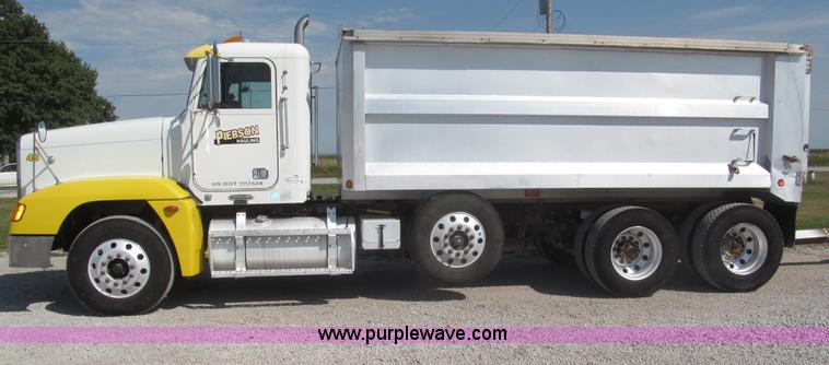 image for item F7115 2001 Freightliner FLD120 tri axle dump truck
