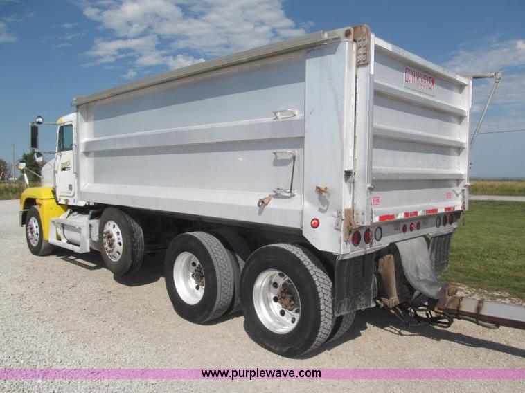 image for item F7115 2001 Freightliner FLD120 tri axle dump truck