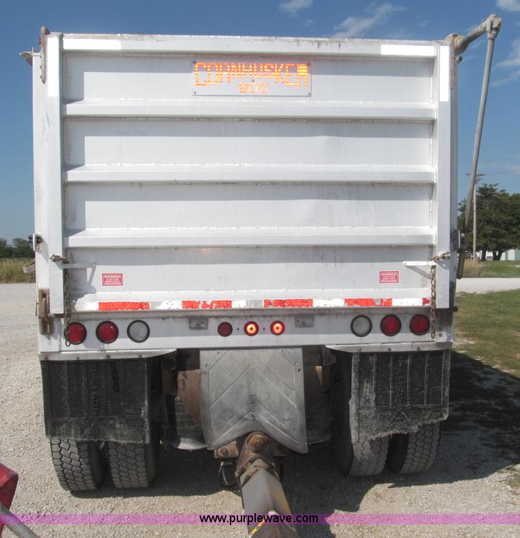 image for item F7115 2001 Freightliner FLD120 tri axle dump truck