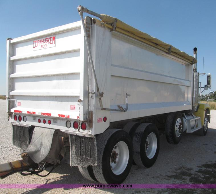 image for item F7115 2001 Freightliner FLD120 tri axle dump truck