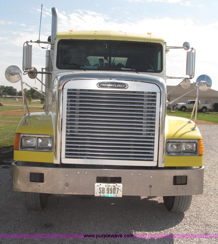 image for item F7115 2001 Freightliner FLD120 tri axle dump truck