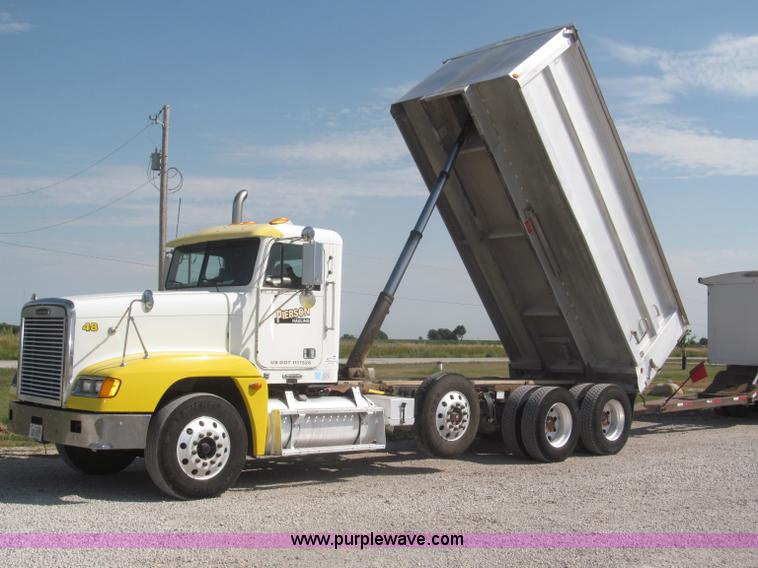image for item F7115 2001 Freightliner FLD120 tri axle dump truck