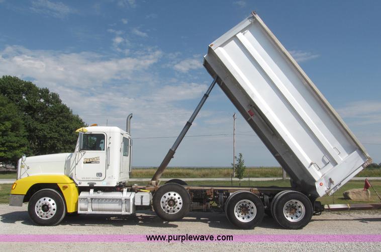 image for item F7115 2001 Freightliner FLD120 tri axle dump truck