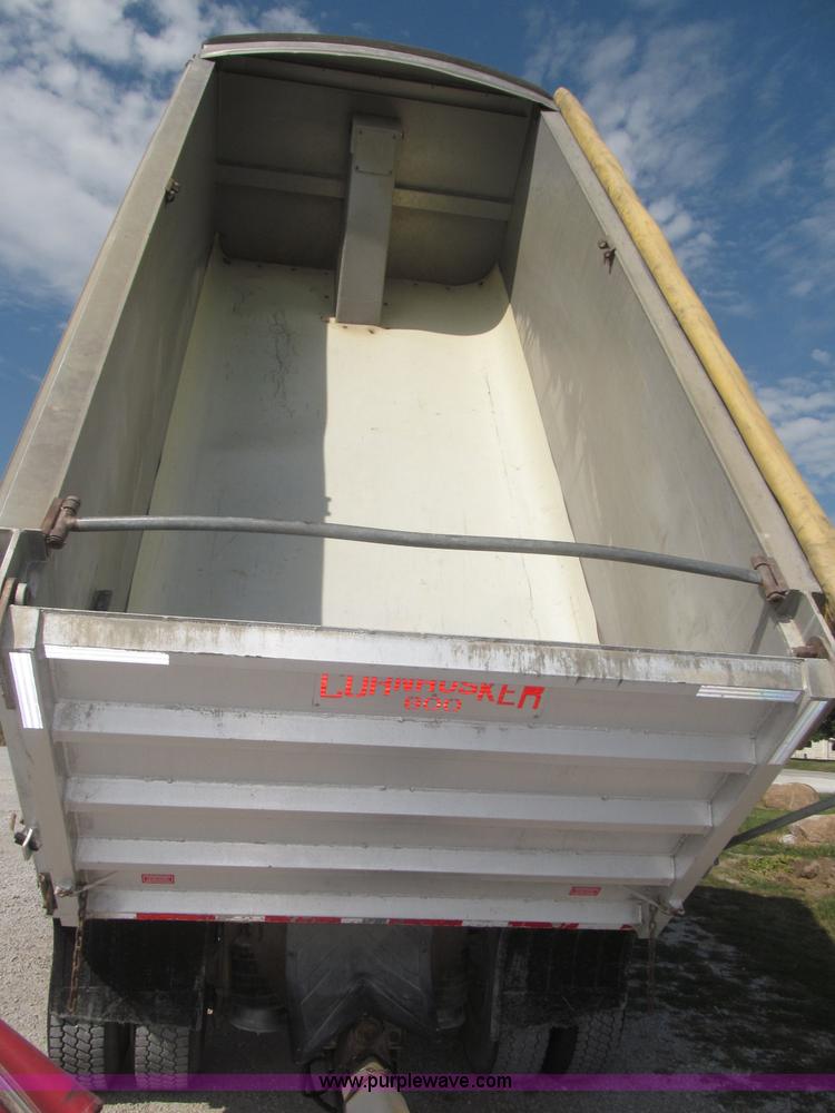 image for item F7115 2001 Freightliner FLD120 tri axle dump truck