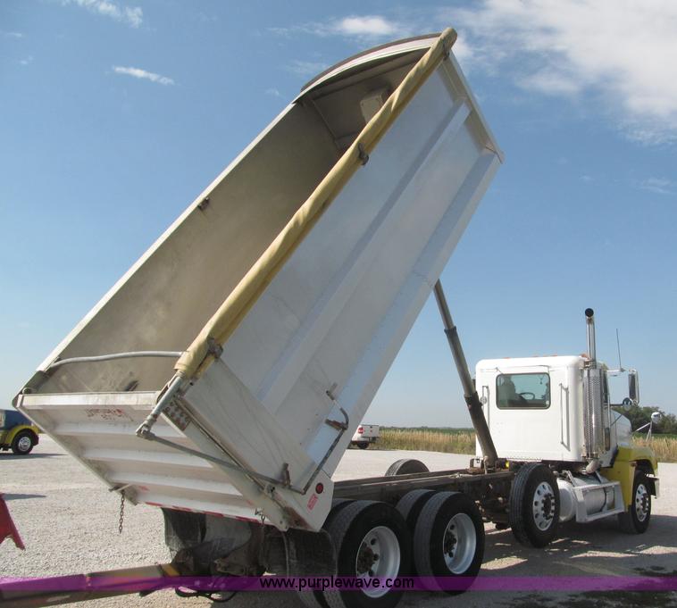 image for item F7115 2001 Freightliner FLD120 tri axle dump truck
