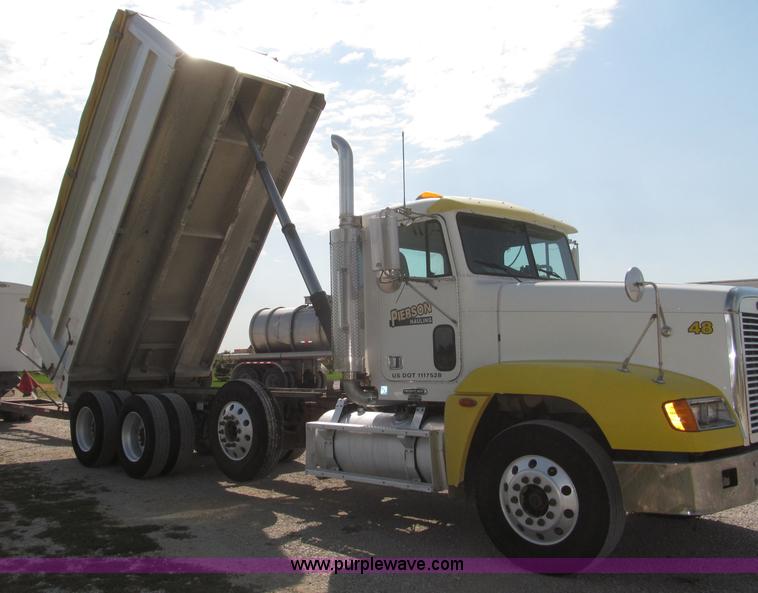 image for item F7115 2001 Freightliner FLD120 tri axle dump truck